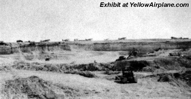 The WW2 Quarry on the Island of Ie Shima with P-47 Thunderbolt Fighter Aircraft in the background.