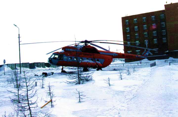 Russian helicopters in front of the Hatanga Hotel