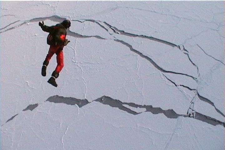 Picture of skydivers free falling over the North Pole.