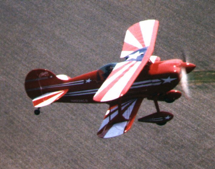 Carlos in his pitts is looking at our Skybolt near Macomb Illinois