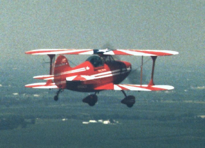 Carlos Santiago flying his Pitts Airplane near Macomb Illinois.