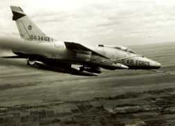 Colonel Comstock Firing Rockets at a Ground Target