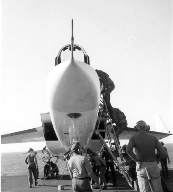 Here's the flight deck crew helping a jet fighter pilot to get into his A5 Vigilante