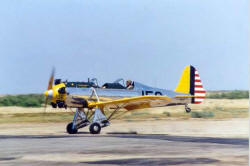 Dan Collier lands his Ryan PT-22 plane on the runway